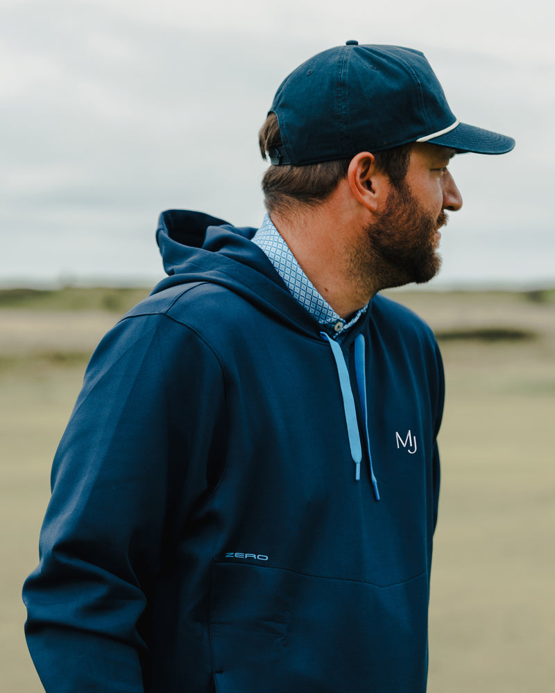 Golfer in a golf hoodie with the Mount Juliet Estate logo